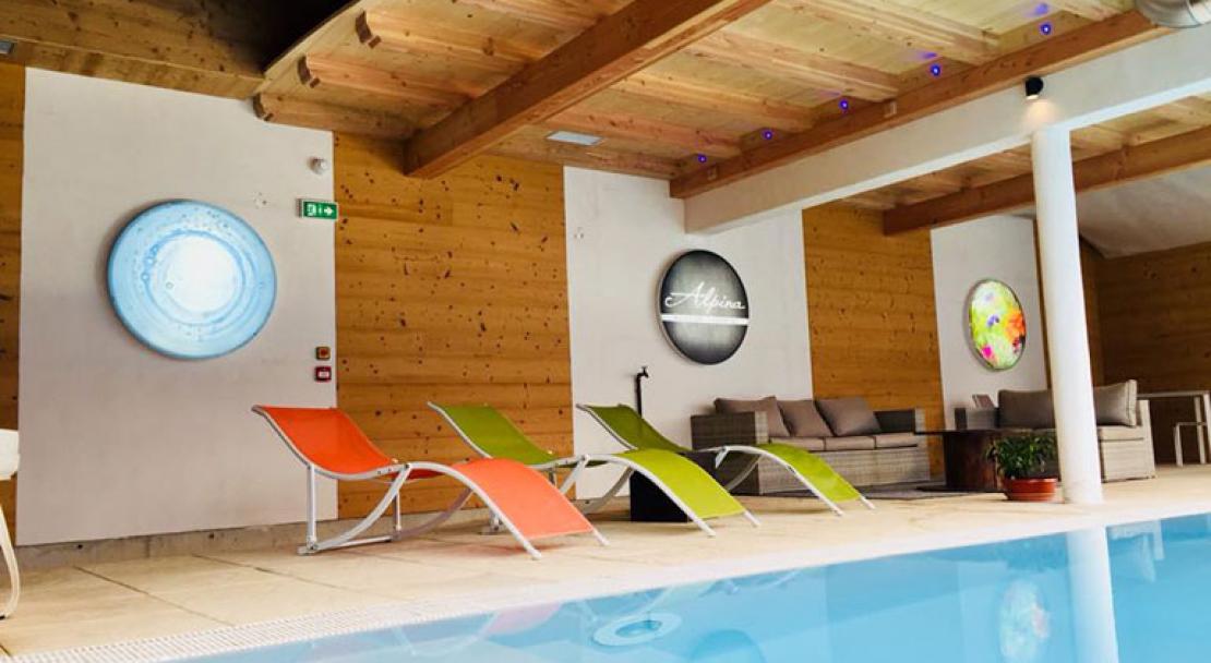 Hotel Alpina Enclosed indoor windows heated swimming pool loungers Morzine