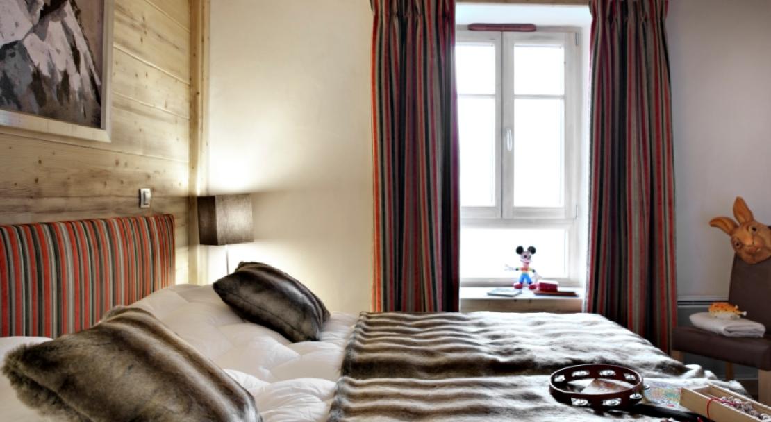 An impression of a bedroom in Le Lodge Hemera - La Rosiere - France 
