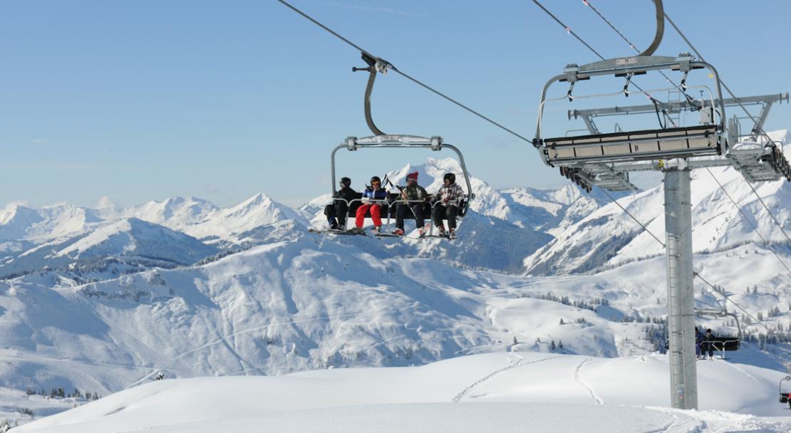 Skiers on a chairlift in Chatel; Copyright: JF Vuarand