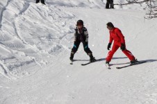 First timers, learning to ski in a La Tania group ski lesson