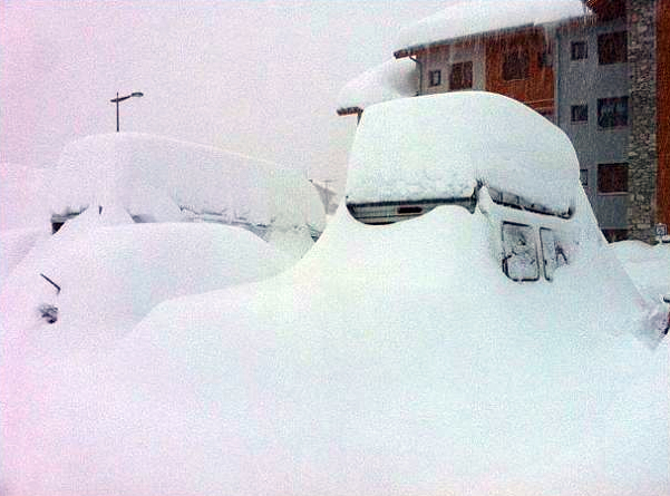 Cars burried in snow in Tignes
