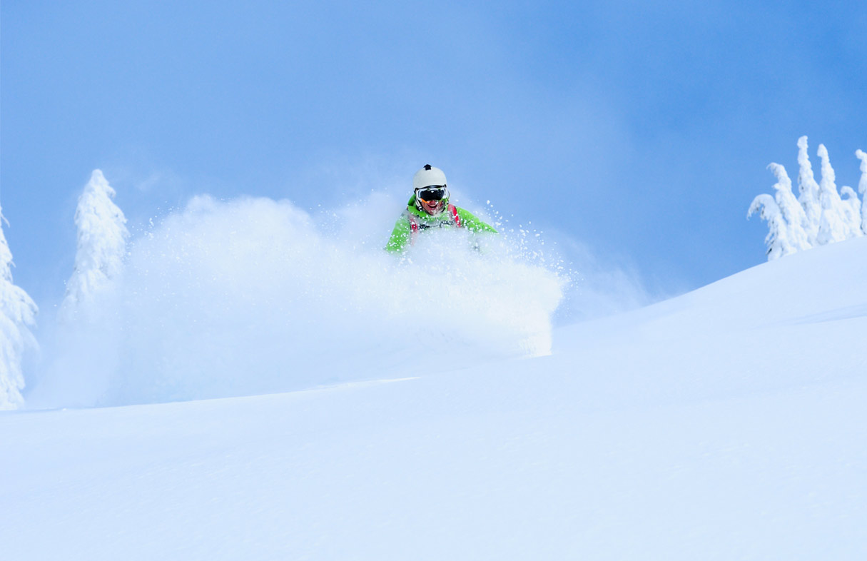 Off Piste Skier in Powder Snow