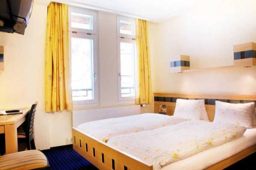 A Double Room in the Hotel and Spa Victoria-Laubehorn - Wengen