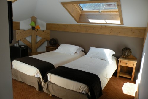 An example of a bedroom at the Hotel Gourmets and Italy in Chamonix