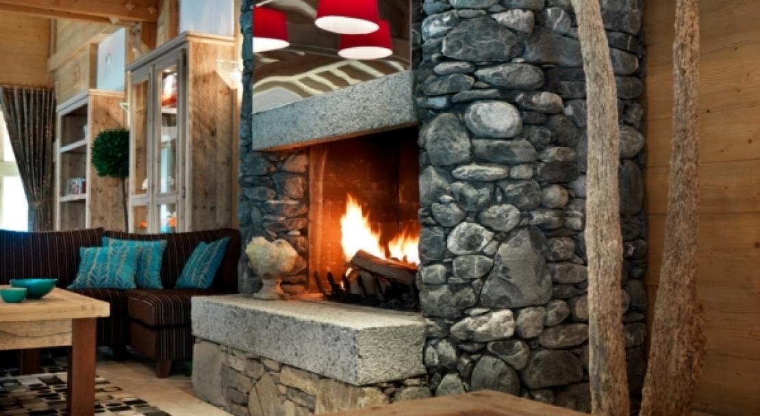 An example of reading by the fire in L'Oree des Neiges, Vallandry, France