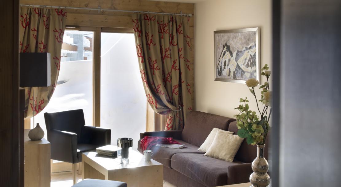 Living room at Le Cristal de l'Alpe; Copyright: Studio Bergoend