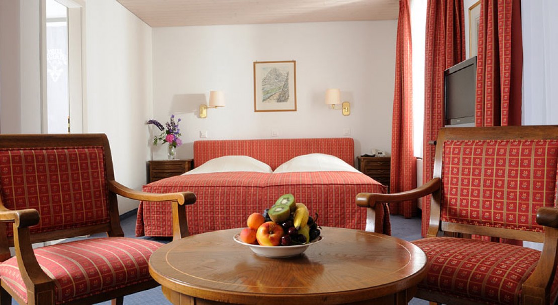 Bedroom at the Hotel Kreuz Und Post Grindelwald