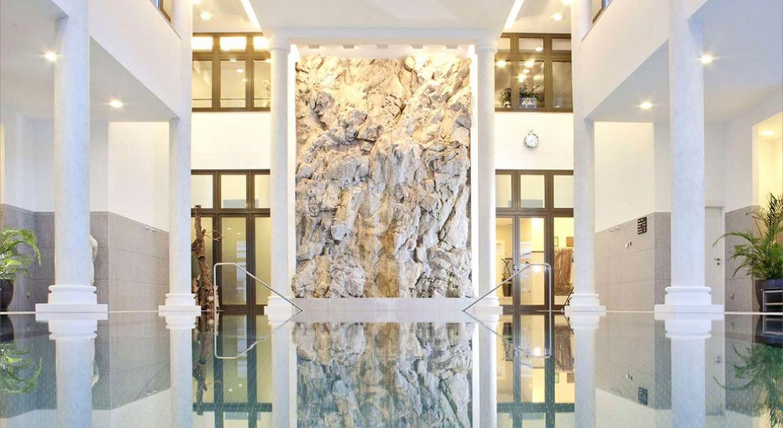 The swimming pool at the Kempinski Grand Hotel des Bains