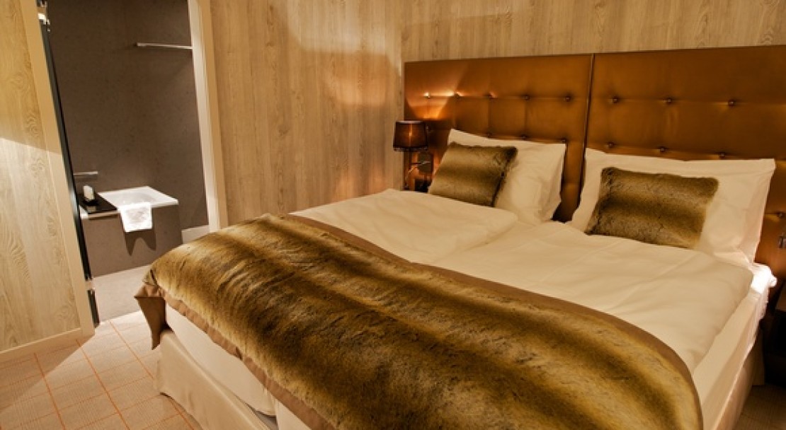 A Bedroom at the Grsicha - DAS Hotel Davos, Switzerland 