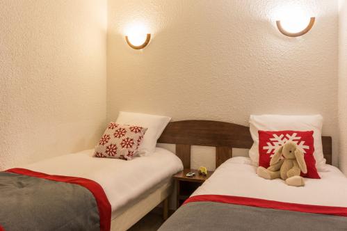 Twin bed alcove Studio Apartment - Sleeps 6 People - # Résidence Les Bergers - Alpe d'Huez; Copyright: Imagera