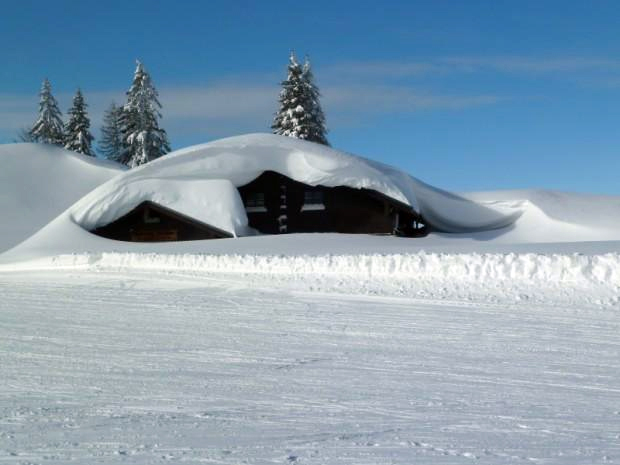 Chalet buried in snow