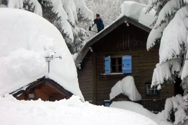 Chalets buried in snow